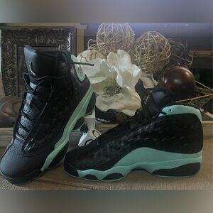 Black and turquoise Jordan’s